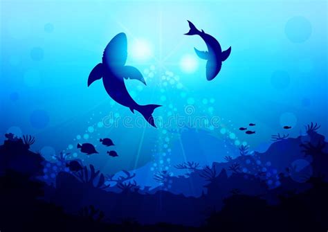 Two Big Sharks Are Circling Under The Water Illuminated By Sunlight And