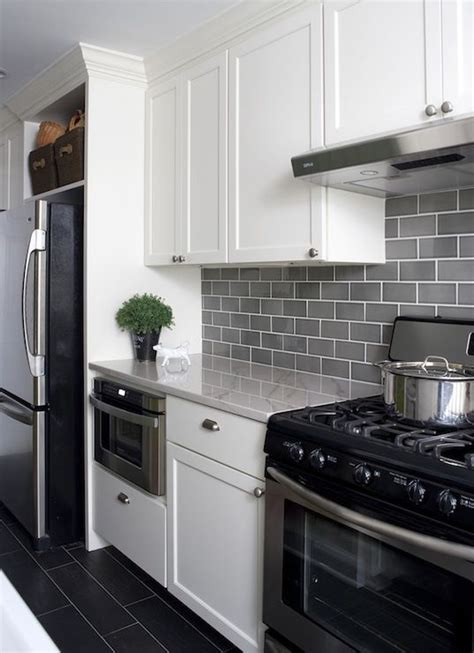 With a variety of different tones gray kitchen. 35 Ways To Use Subway Tiles In The Kitchen - DigsDigs