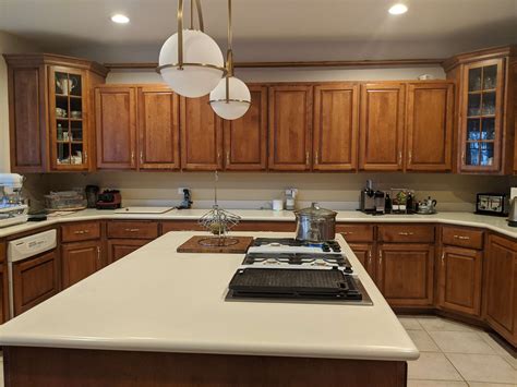 How To Lighten Wood Cabinets Without Painting