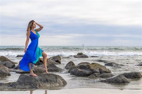 Lovely Brunette Latin Model Poses Outdoors On A Beach At Sunset Stock Image Image Of Casual