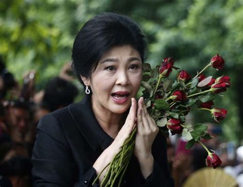 ousted thai pm yingluck shinawatra sentenced in absentia to 5 years in prison for negligence