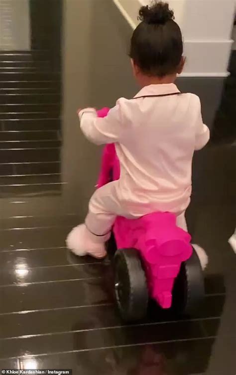 Khloe Kardashian Cuddles With Daughter True In Matching Light Pink