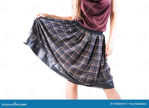 Photo Of Girl Holds Plaid Skirt With Her Hands Stock Photo Image Of