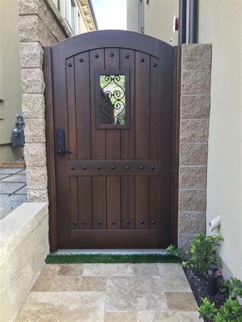 Custom Wood Gate by Garden Passages - Tuscan Style Arched Top With