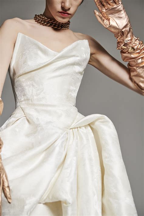 The one you admired from afar but secretly thought, she's the only woman in the world who could pull that off? apparently plenty of other ladies thought they could, too, because a version. Vivienne Westwood Bird of Paradise wedding dress - Browns ...