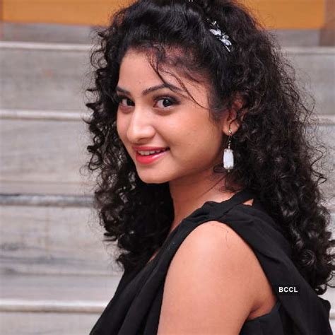 Vishnu Priya Looks Cute While She Poses In A Black Dress During A