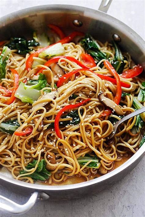 For the lo mein, bring a large pot of water to boil for pasta. Close up of Chinese Vegetables Lo Mein in a silver ...