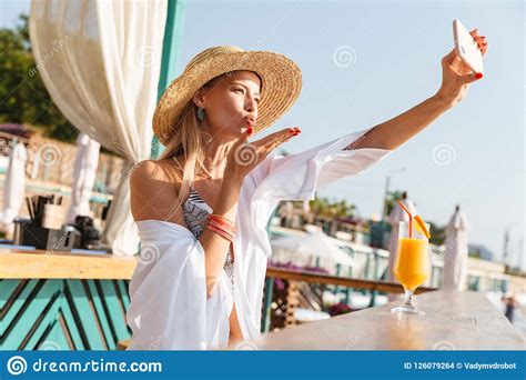 Photo Of Stunning Blond Woman 20s In Straw Hat Smiling And Taking