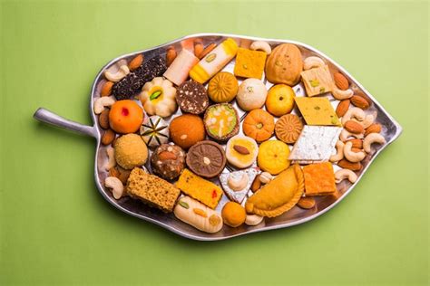 Premium Photo Mix Mithai Or Milk Made Sweets Of Indian And Pakistani