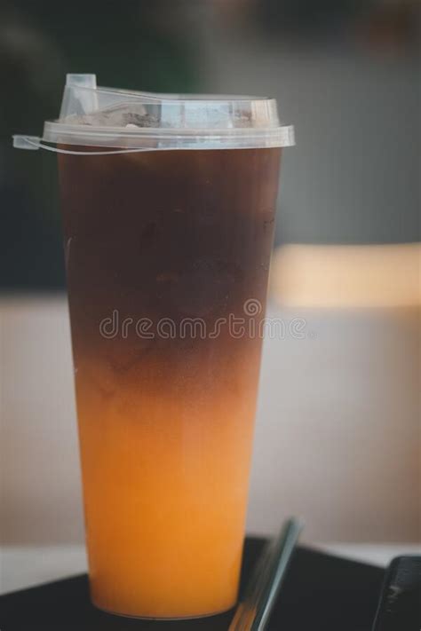 Iced Black Coffee Mix With Orange Juice Stock Image Image Of Beverage