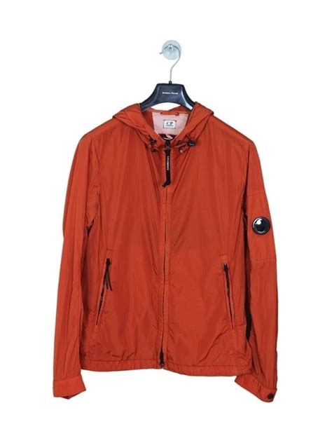 c p company nylon chrome hooded jacket in orange northern threads