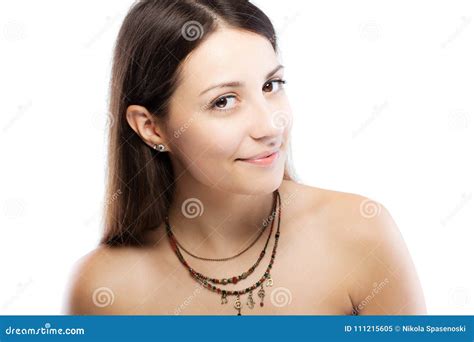 Surprised Brunette Girl Wearing A Necklace With Generic Symbols Stock