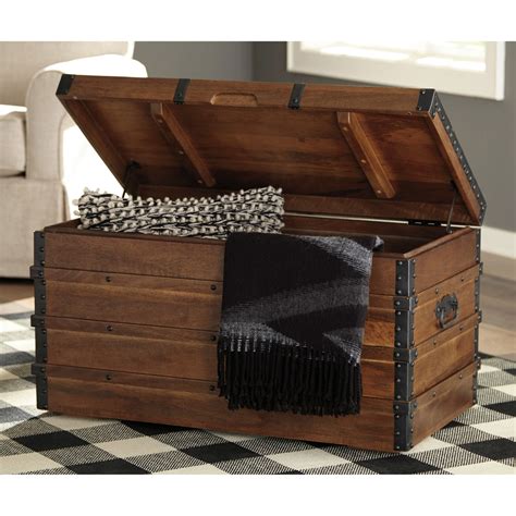 Signature Design By Ashley Kettleby Storage Trunk Living Room Tables