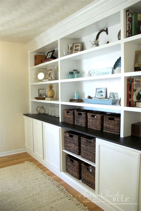 Corner bookshelf with desk tutorial make a corner shelf and attach it to a desk. DIY Built In Bookcase Reveal - Artsy Chicks Rule®