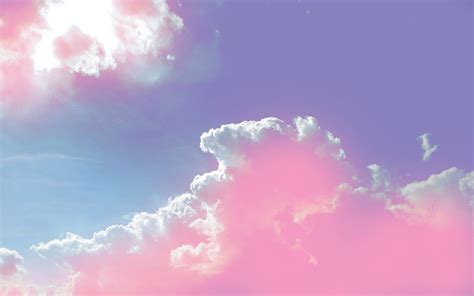 If you're on your computer or phone for hours a day (and let's be real—you are), you can keep things interesting with desktop wallpaper. | Pink clouds wallpaper, Cloud wallpaper, Sky aesthetic
