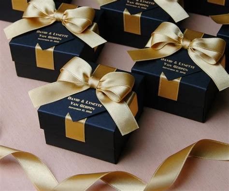 Adorning a whole list of all our products, this section allows you to pick and choose, to essentially curate, your own black box. 25 Black & Gold wedding favor gift box with satin ribbon ...