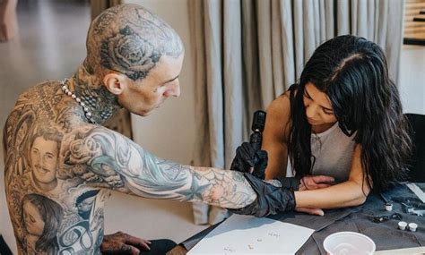 Kim khloe kourtney kardashian wear kardashian kollection blue leopard. Kourtney Kardashian puts tattoo on Travis Barker: "She's a ...