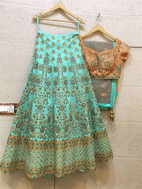This dress gives you stylish looks with a bit of traditional. Fully Stitched Turquoise Lehenga Choli In Silk SFB0023 ...