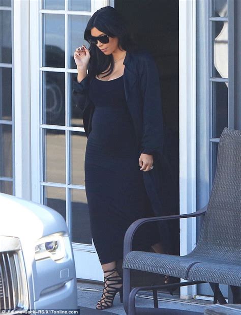 Kim Kardashian Covers Up After Nude Pregnancy Selfie The Night Before