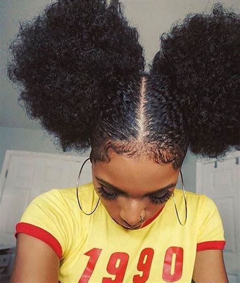 Two Sleek Puffs Part Hair Down The Middle Or However You Would Like