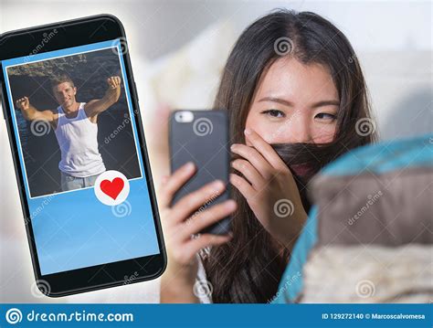 Whether you want to make new friends or venture into a romantic relationship, these apps might just help you along. Young Beautiful And Happy Asian Korean Woman Using ...