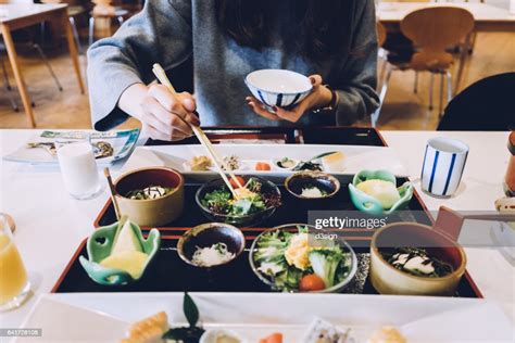 Woman Is Having Meal In A Japanese Restaurant Photo Getty Images