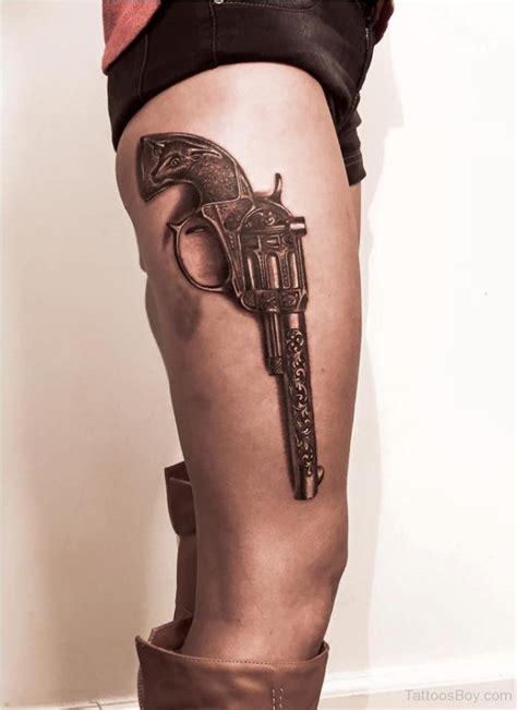 Beautiful Gun Tattoo On Thigh Tattoos Designs