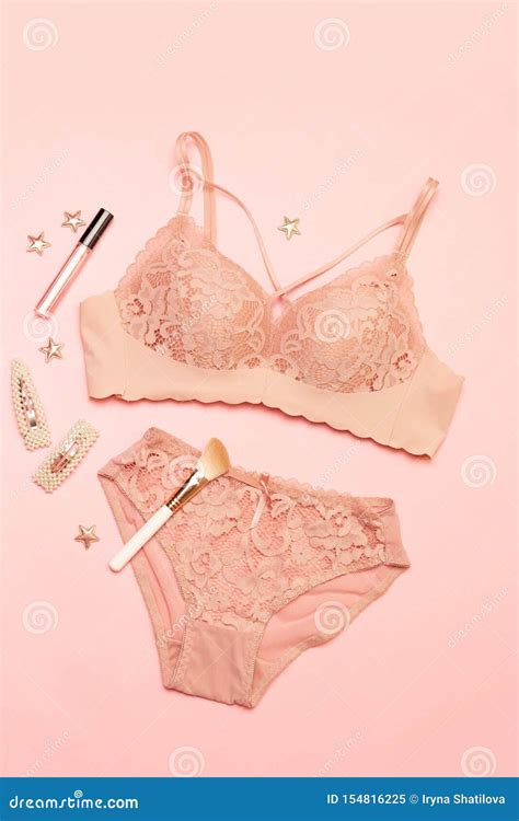 Set Of Glamorous Stylish Lace Lingerie With Women`s Accessories On A Pink Background Stock Image