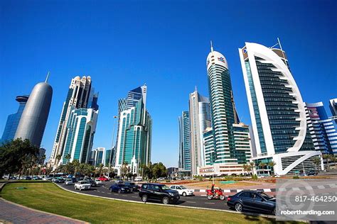 Qatar, officially the state of qatar, is an emirate in the middle east and southwest asia, occupying the small qatar peninsula on the northeastern coast of the larger arabian peninsula. Qatar, Doha City, The Corniche, | Stock Photo