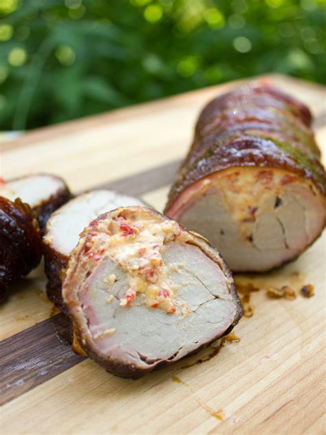 Bacon Wrapped Smoked Pork Tenderloin Stuffed With Roasted Red Peppers