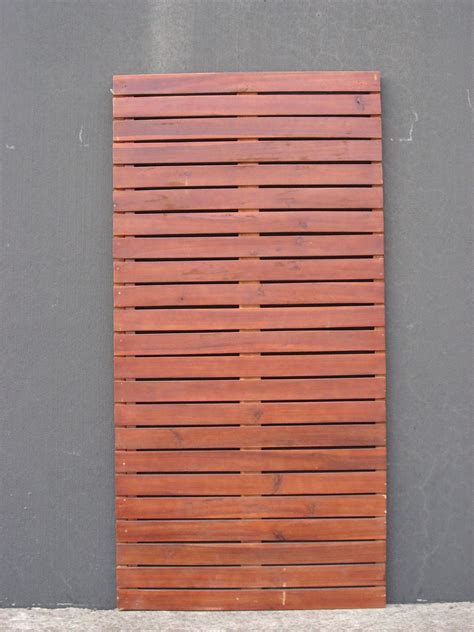 A slatted screen at the end of the garden can make a seating area private. Screen Panel Timber 1800x900x30mm Vertical Slat - Bunnings ...
