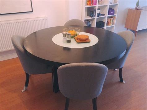 With a rotating top, this table is multifunctional and unique. John Lewis Dining table with rotating glass top | in ...