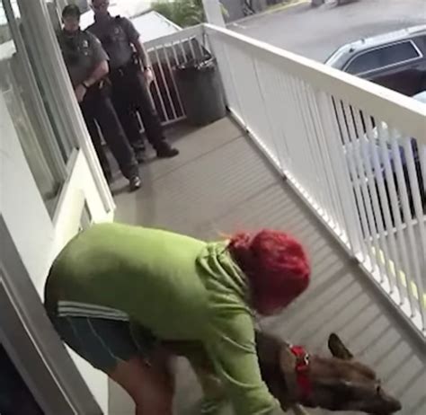 Deranged Woman Gets Mad And Throws Her Helpless Dog Off Second Floor Balcony