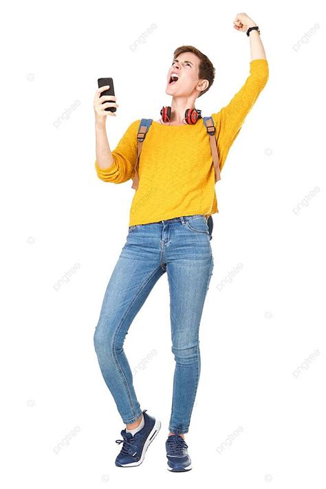 A Jubilant Young Lady Ecstatically Holding Her Phone And Victoriously