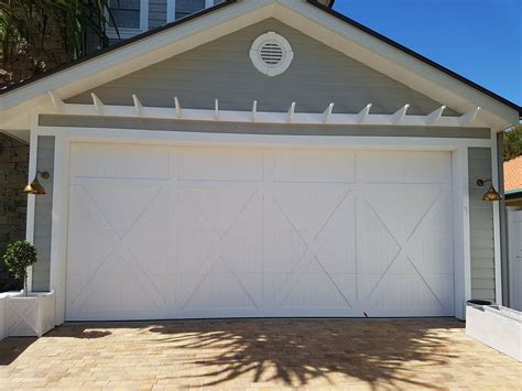 Professional garage door service available and reliable when you need it! Hampton's Style Custom Garage Door — Stoddart Group ...