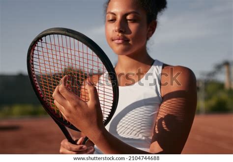 Smiling African American Female Tennis Player Stock Photo 2104744688