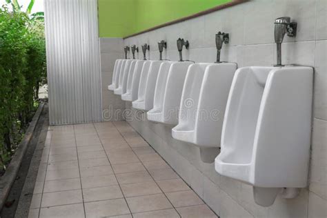 Row Of Outdoor Urinal Men Public Toilet White Urinals In Men Bathroom Stock Image Image Of