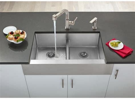 It is smaller, and isn't usually used for cleaning: Elkay ECTRUFA32179 36 Inch Double Bowl Farmhouse Kitchen ...