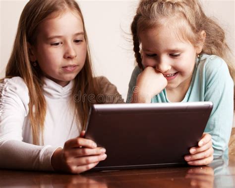 Kids Playing On Tablet Stock Photo Image Of Offspring 78950448