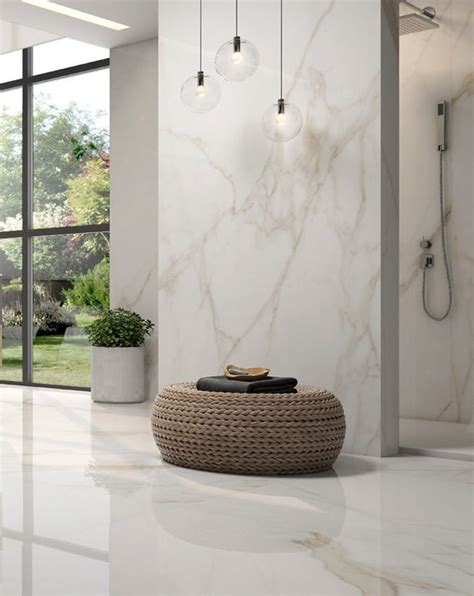 calacatta gold marble effect polished porcelain tile 120 x 120 cm ivy tile