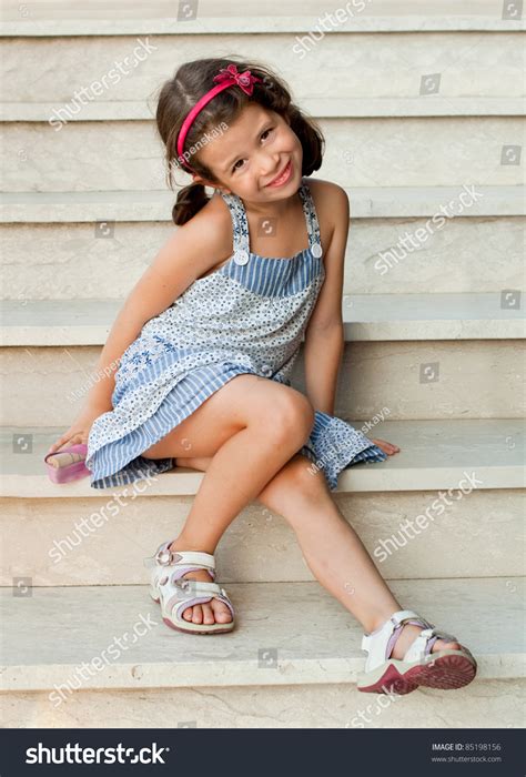 Smiling Girl Summer Dress Sitting On Stock Photo 85198156 Shutterstock