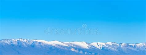 Snow Capped Mountain Top Panorama At Sunrise Stock Photo Image Of