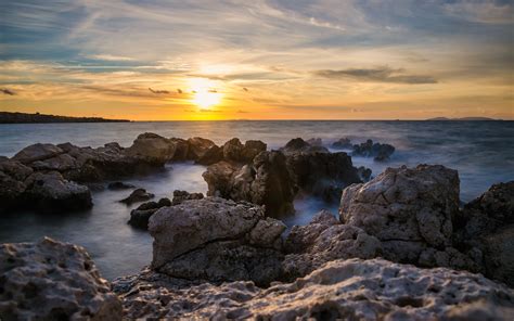 Download Wallpaper 3840x2400 Sunset Sea Rocks Water Landscape 4k