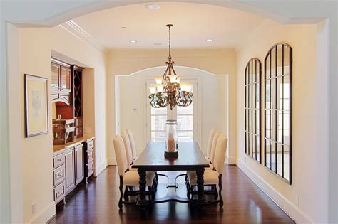 Start with the installation height. Tuscan Style: Light and Bright Tuscan Style Dining Room ...