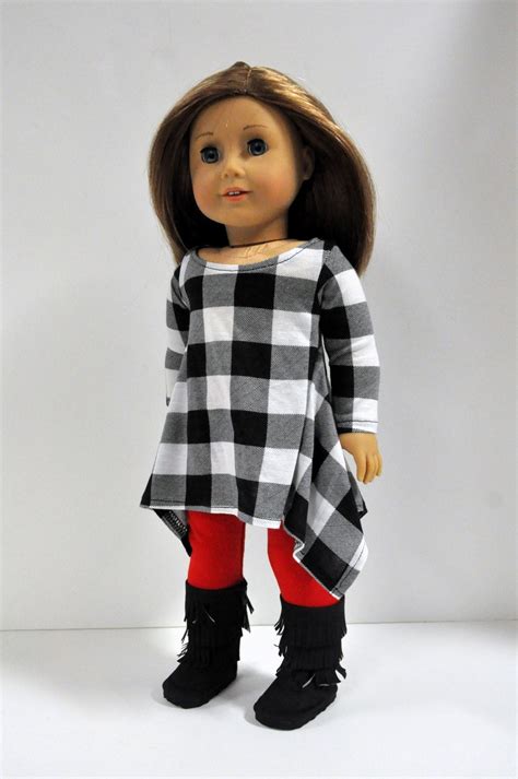 black and white buffalo plaid twirly top with red leggings