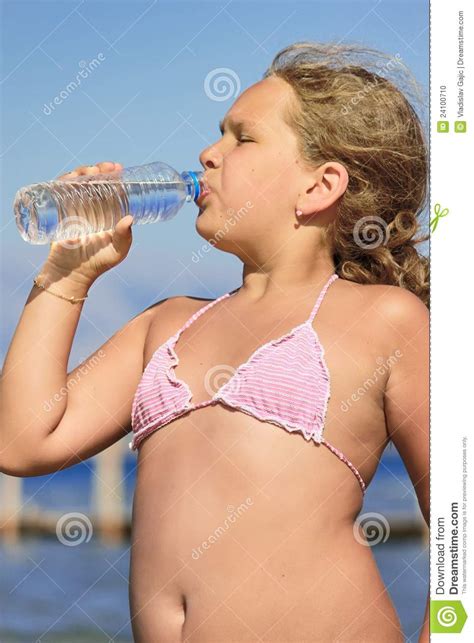 Girl Drinking Water From The Bottle Stock Photo Image
