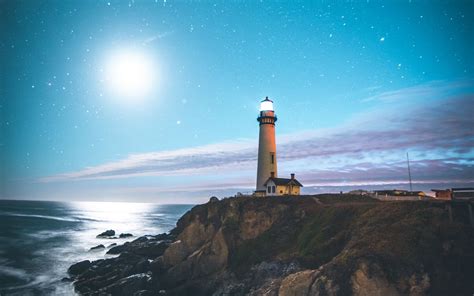 Download Wallpaper 1680x1050 Lighthouse Starry Sky Shore Pescadero