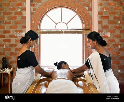 Woman Receiving Abhyanga Ayurvedic Massage Kairali Ayurvedic Health