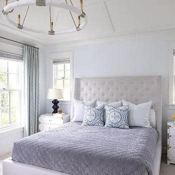 While coffered ceilings found in residential homes are considerably less ornate than they're counterparts in many large public buildings—courthouses, historic churches, and art galleries—the ceiling designs still create quite the focal point. White Campaign Nightstands on Navy Blue Lamps | Grey color ...