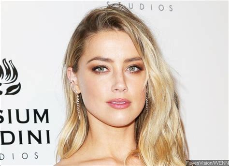 Amber Heard Steps Out In Unzipped Pants New Fashion Trend